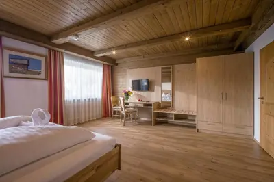 Ein Bett oder Betten in einem Zimmer der Unterkunft Hotel Restaurant Gradlwirt
