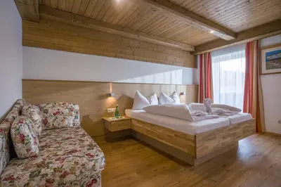 Ein Bett oder Betten in einem Zimmer der Unterkunft Hotel Restaurant Gradlwirt