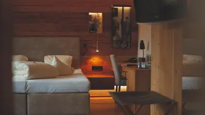 Ein Bett oder Betten in einem Zimmer der Unterkunft Bauernhof Hotel Oberschwarzach