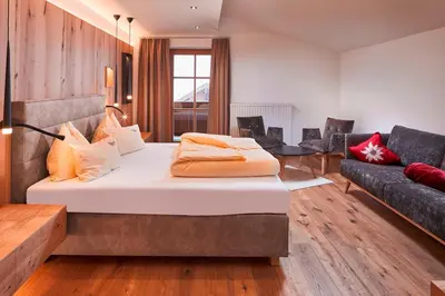 Ein Bett oder Betten in einem Zimmer der Unterkunft Bauernhof Hotel Oberschwarzach