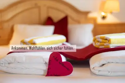 Ein Bett oder Betten in einem Zimmer der Unterkunft Skirast - Kirchberg