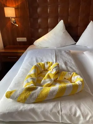 Ein Bett oder Betten in einem Zimmer der Unterkunft Skirast - Kirchberg