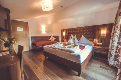 Ein Bett oder Betten in einem Zimmer der Unterkunft Skirast - Kirchberg