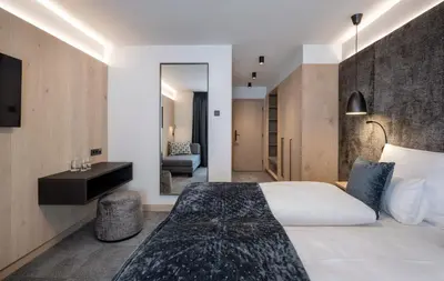 Ein Bett oder Betten in einem Zimmer der Unterkunft Ski & Bike Hotel Wiesenegg