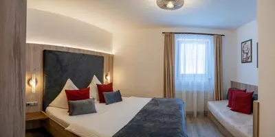 Ein Bett oder Betten in einem Zimmer der Unterkunft Landhaus Schiestl
