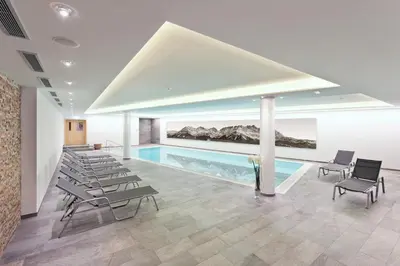 Der Swimmingpool an oder in der Nähe von Alpen Glück Hotel Kirchberger Hof