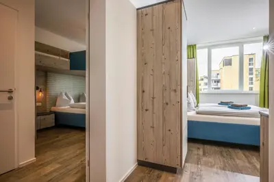 Ein Bett oder Betten in einem Zimmer der Unterkunft Aparthotel Backstage