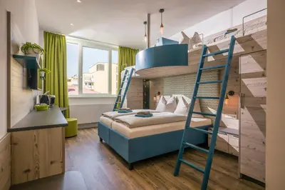 Ein Bett oder Betten in einem Zimmer der Unterkunft Aparthotel Backstage