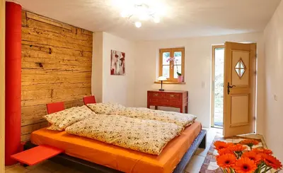 Ein Bett oder Betten in einem Zimmer der Unterkunft Noba Hof