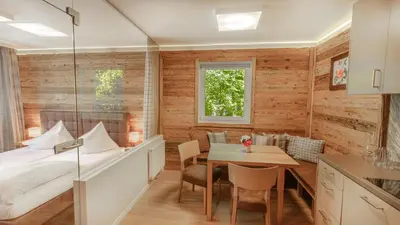 Ein Bett oder Betten in einem Zimmer der Unterkunft Rosentalerhof Hotel & Appartements