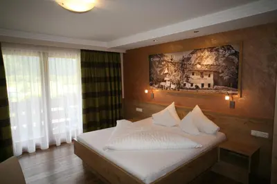 Ein Bett oder Betten in einem Zimmer der Unterkunft Frühstückshotel Margret