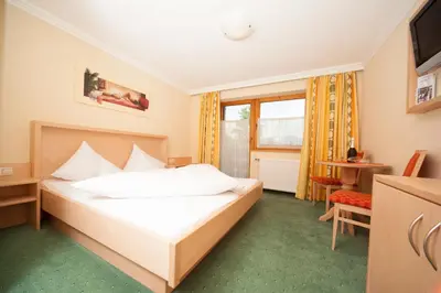 Ein Bett oder Betten in einem Zimmer der Unterkunft Frühstückshotel Margret