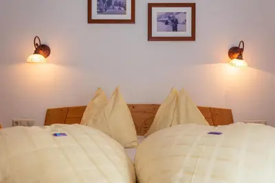 Ein Bett oder Betten in einem Zimmer der Unterkunft Pension Seighof