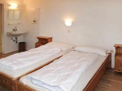 Ein Bett oder Betten in einem Zimmer der Unterkunft Holiday Home Schwalbenhof by Interhome