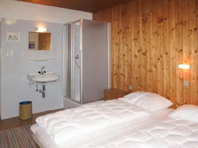 Ein Bett oder Betten in einem Zimmer der Unterkunft Holiday Home Schwalbenhof by Interhome