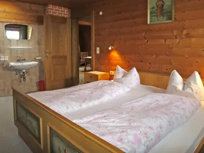 Ein Bett oder Betten in einem Zimmer der Unterkunft Apartment Punggerhof by Interhome