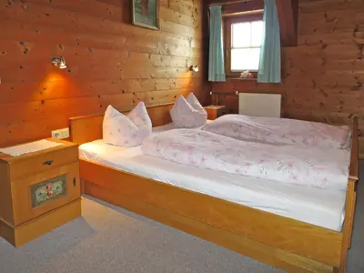 Ein Bett oder Betten in einem Zimmer der Unterkunft Apartment Punggerhof by Interhome