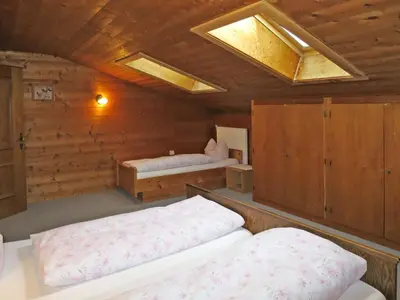 Ein Bett oder Betten in einem Zimmer der Unterkunft Apartment Punggerhof by Interhome