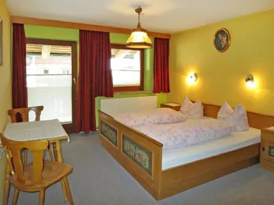 Ein Bett oder Betten in einem Zimmer der Unterkunft Apartment Punggerhof by Interhome