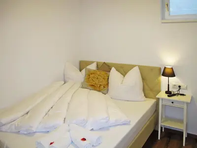 Ein Bett oder Betten in einem Zimmer der Unterkunft Apartment Tamerl-2 by Interhome