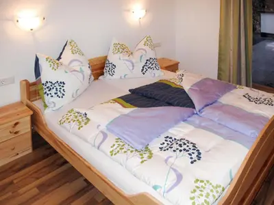 Ein Bett oder Betten in einem Zimmer der Unterkunft Apartment Edelweiss by Interhome