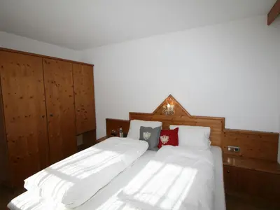 Ein Bett oder Betten in einem Zimmer der Unterkunft Chalet Heisenhaushütte by Interhome