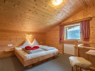 Ein Bett oder Betten in einem Zimmer der Unterkunft Chalet Talbach by Interhome