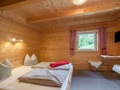 Ein Bett oder Betten in einem Zimmer der Unterkunft Chalet Talbach by Interhome