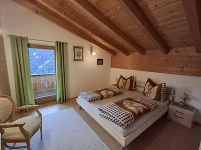 Ein Bett oder Betten in einem Zimmer der Unterkunft Holiday Home Reichegger by Interhome
