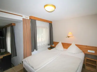 Ein Bett oder Betten in einem Zimmer der Unterkunft Apartment Lechners Wohnwelt-1 by Interhome