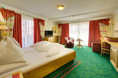 Ein Bett oder Betten in einem Zimmer der Unterkunft Boutique-Hotel Bauer