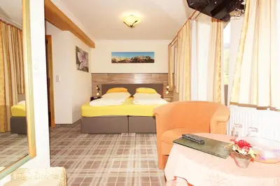 Ein Bett oder Betten in einem Zimmer der Unterkunft Pension Alexandra