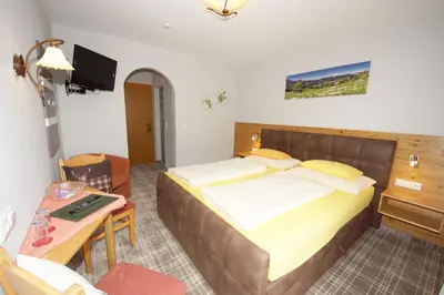 Ein Bett oder Betten in einem Zimmer der Unterkunft Pension Alexandra