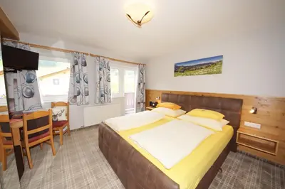 Ein Bett oder Betten in einem Zimmer der Unterkunft Pension Alexandra