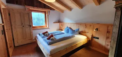 Ein Bett oder Betten in einem Zimmer der Unterkunft Pension Wassererhof
