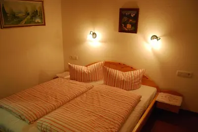 Ein Bett oder Betten in einem Zimmer der Unterkunft Pension Wassererhof