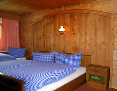 Ein Bett oder Betten in einem Zimmer der Unterkunft Pension Wassererhof