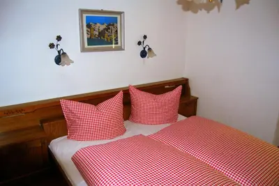 Ein Bett oder Betten in einem Zimmer der Unterkunft Pension Wassererhof