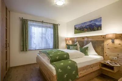Ein Bett oder Betten in einem Zimmer der Unterkunft Alpenresidenz Unterrainer