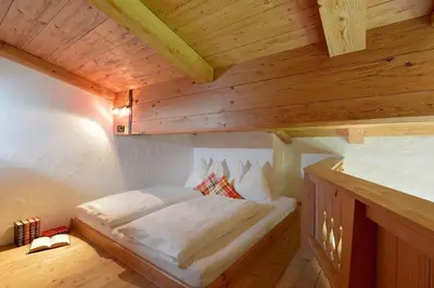 Ein Bett oder Betten in einem Zimmer der Unterkunft Alpenresidenz Unterrainer