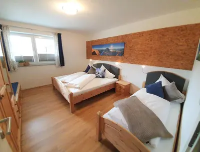Ein Bett oder Betten in einem Zimmer der Unterkunft Ferienwohnung Glockenblume