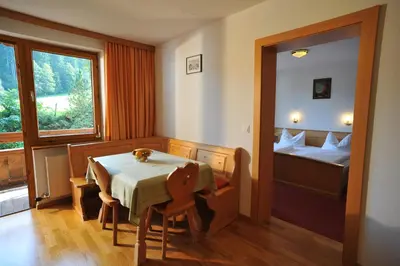 Ein Bett oder Betten in einem Zimmer der Unterkunft Appartements Strobl