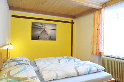 Ein Bett oder Betten in einem Zimmer der Unterkunft Apart Pfister
