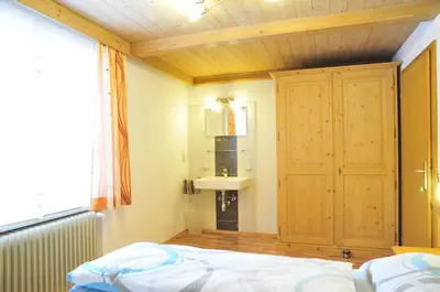 Ein Bett oder Betten in einem Zimmer der Unterkunft Apart Pfister