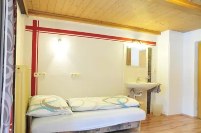 Ein Bett oder Betten in einem Zimmer der Unterkunft Apart Pfister