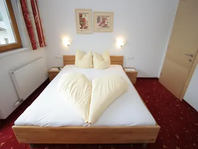 Ein Bett oder Betten in einem Zimmer der Unterkunft Spacious Apartment in Uderns near Ski Area