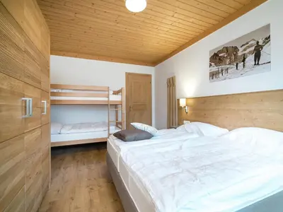 Ein Bett oder Betten in einem Zimmer der Unterkunft Chalet in Wald near Zillertal Arena