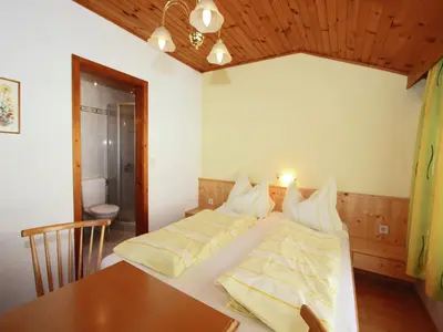 Ein Bett oder Betten in einem Zimmer der Unterkunft Vintage Apartment in Fügen near Ski Area