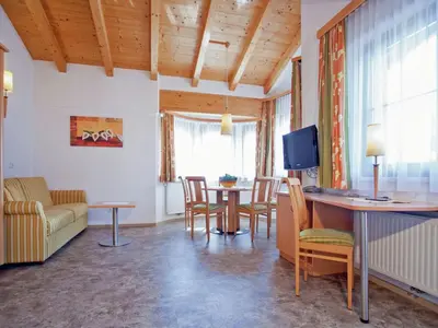 Ein Sitzbereich in der Unterkunft Holiday home in Kaltenbach near ski lift