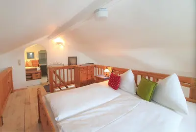 Ein Bett oder Betten in einem Zimmer der Unterkunft Wexhaus